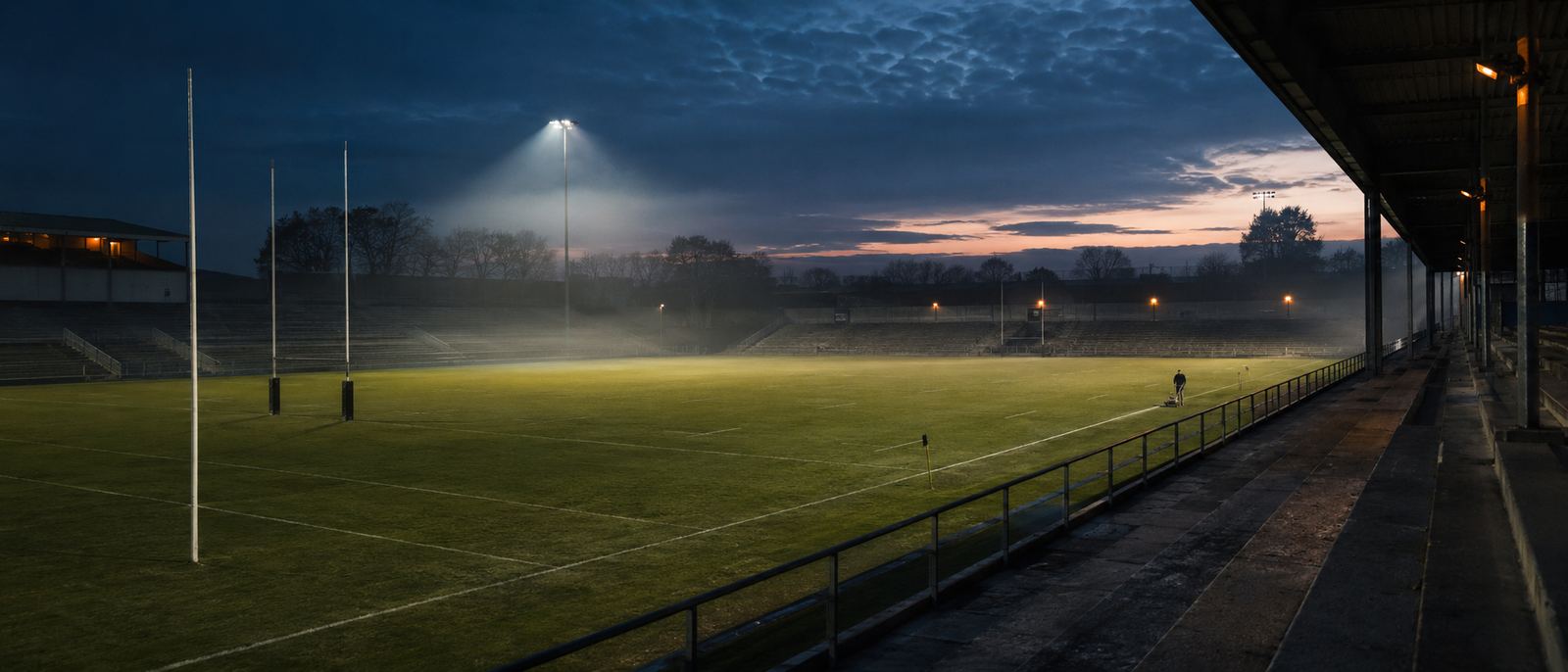 An empty club ground at dusk